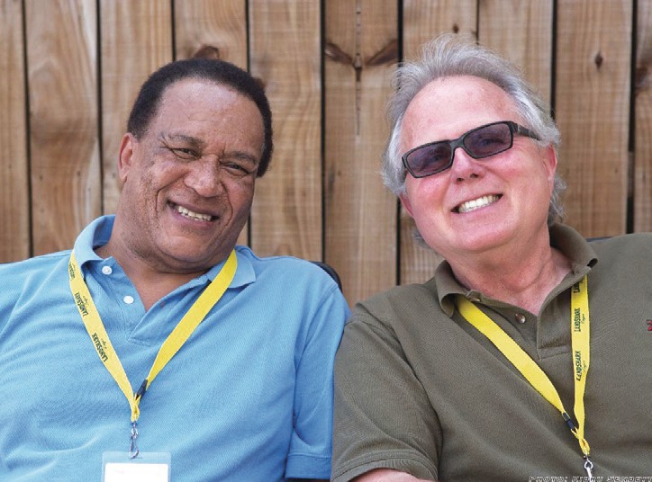 Robert Greenidge and Michael Utley smiling together